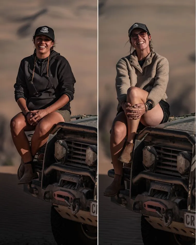 The two of Wandering Pango, each on the bonnet of their Defender